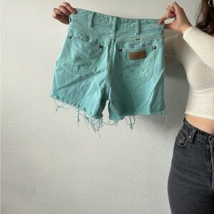 Teal wrangler cut offs